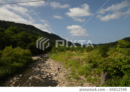 Mountain and sky scenery seen from a local road in Hokkaido Mountain and sky scenery seen from a local road in Hokkaido 84812590