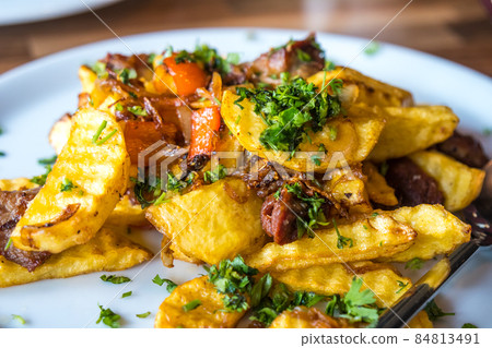 fried potatoes and meat, Ojakhuri - traditional georgian food fried potatoes and meat, Ojakhuri - traditional georgian food 84813491