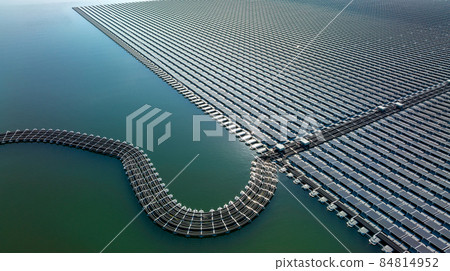 Aerial view floating solar cell power plant with solar cell generate the electric on the lake, Floating solar panels and cell platform on the water ecological energy, Alternative renewable energy. Aerial view floating solar cell power plant with solar cell generate the electric on the lake, Floating solar panels and cell platform on the water ecological energy, Alternative renewable energy. 84814952