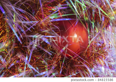 Happy New Year Christmas tree decorates on background bokeh of side flickering light bulbs garlands for family holiday. Happy New Year Christmas tree decorates on background bokeh of side flickering light bulbs garlands for family holiday. 84815586