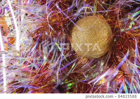 Happy New Year Christmas tree decorates on background bokeh of side flickering light bulbs garlands for family holiday. Happy New Year Christmas tree decorates on background bokeh of side flickering light bulbs garlands for family holiday. 84815588