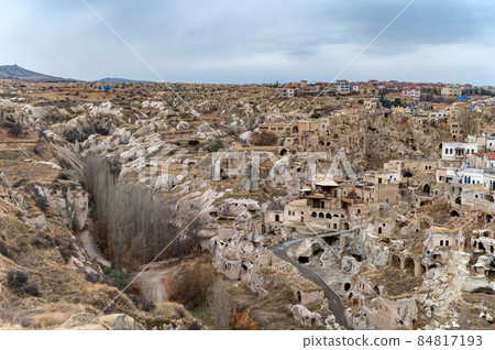 Landscape view of Uchisar, Cappadocia, Turkey under cloudy sky 84817193