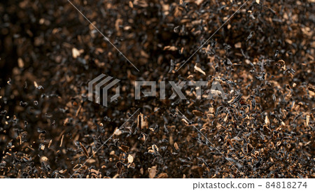 Freeze Motion Shot of Exploding Dry Tea Leaves. Freeze Motion Shot of Exploding Dry Tea Leaves. 84818274