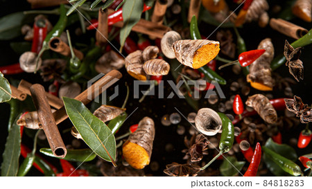 Freeze Motion Shot of Flying Mix Spices. Freeze Motion Shot of Flying Mix Spices. 84818283
