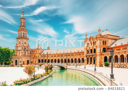 Seville, Spain. Canal Promenade Around Famous Landmark - The Plaza De Espana In Seville, Andalusia, Spain. Renaissance Revival Style. Spain Square 84818821