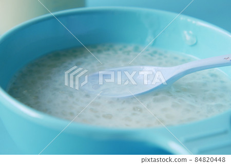 Close up of baby food in a bowl on table Close up of baby food in a bowl on table 84820448