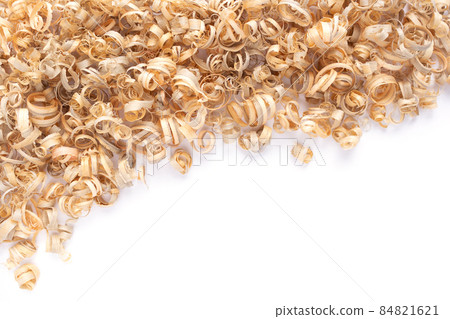 Wood shavings isolated on white background. Wooden shaving from old plank board Wood shavings isolated on white background. Wooden shaving from old plank board 84821621