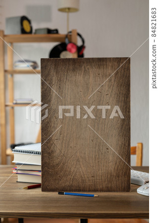 Name plate wood background on table in office. Student home workplace Name plate wood background on table in office. Student home workplace 84821683