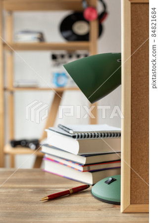 Cork board frame background on table in office. Student home workplace 84821684