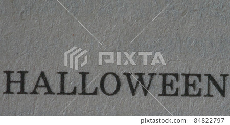 The word "halloween" is printed on a piece of paper, close-up. The word "halloween" is printed on a piece of paper, close-up. 84822797