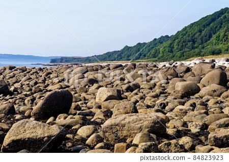 Pebble beach at Machrie Bay - Scotland Pebble beach at Machrie Bay - Scotland 84823923