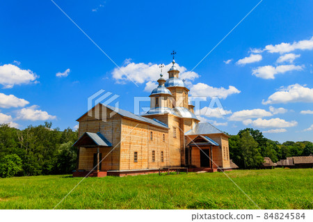 Ancient reconstructed wooden church of St. Nicolas in Pyrohiv (Pirogovo) village near Kiev, Ukraine 84824584