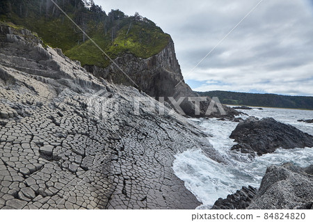 The cliff Stolbachaty is unicum nature attraction, included in List of Unesco. kunashir island. 84824820