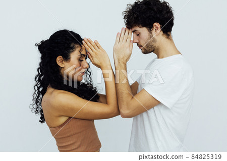 Man and woman together doing exercises family yoga asana fitness Man and woman together doing exercises family yoga asana fitness 84825319