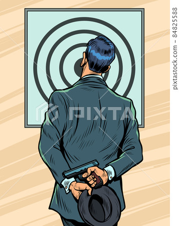 a man in a suit in a shooting gallery with a pistol, examines the target, the result of shooting 84825588