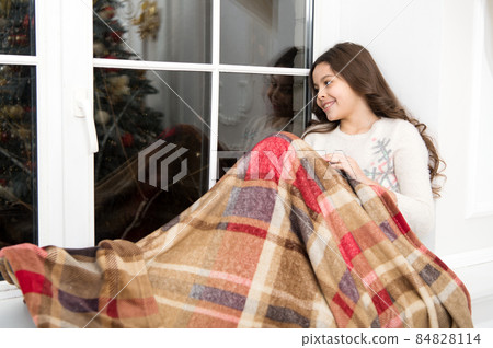 New year. Little girl child looking at window. Present xmas 84828114
