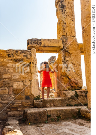 Girl in Hierapolis ancient city ruins Pamukkale Turkey UNESCO world heritage 84828145