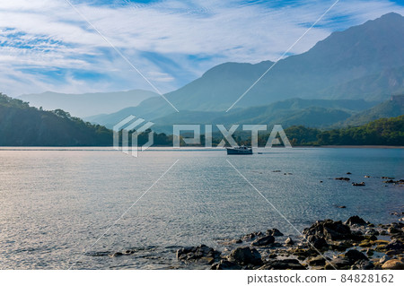 sea bay among the mountains, view of the South Harbor of the ancient city of Phaselis, Turkey sea bay among the mountains, view of the South Harbor of the ancient city of Phaselis, Turkey 84828162