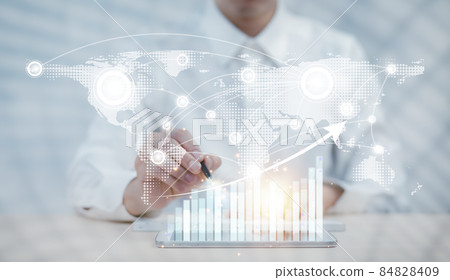 Modern Business World, businessman navigating the virtual world map,Business analytics and financial concept, Plans to increase business growth and an increase ,Technology and Business trend analysis. Modern Business World, businessman navigating the virtual world map,Business analytics and financial concept, Plans to increase business growth and an increase ,Technology and Business trend analysis. 84828409
