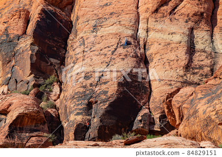 People doing rock climbing sports People doing rock climbing sports 84829151