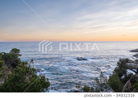Evening time sea with beautiful dramatic sky with some clouds 84832316