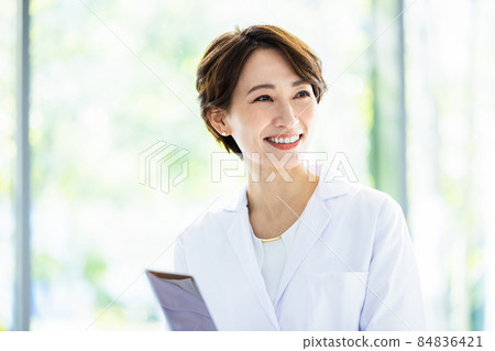 Female in a white coat Business meeting Business negotiations Shooting cooperation: LINK FOREST Female in a white coat Business meeting Business negotiations Shooting cooperation: LINK FOREST 84836421