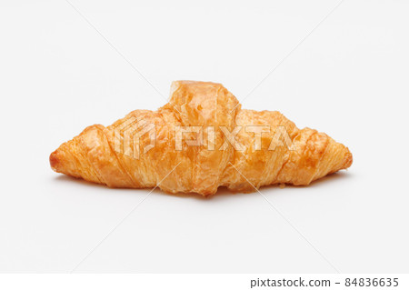 Freshly baked croissants in tan on a white background Freshly baked croissants in tan on a white background 84836635