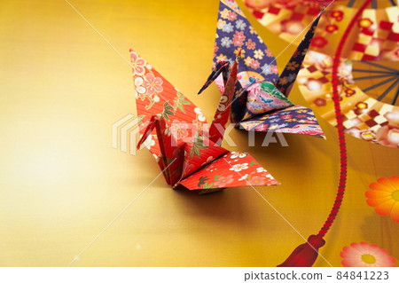 Red and blue festive paper cranes Red and blue festive paper cranes 84841223