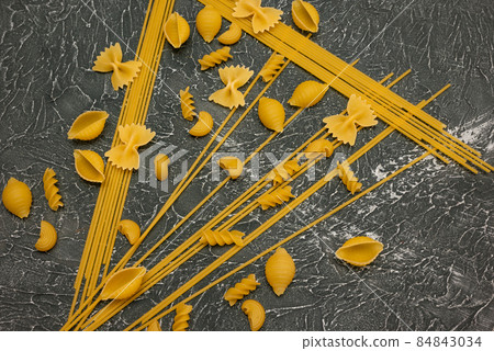 top view Various types of Italian pasta on wooden background top view Various types of Italian pasta on wooden background 84843034