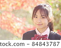 Junior high school student with autumn leaves back ponytail 84843787