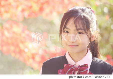 Junior high school student with autumn leaves back ponytail 84843787