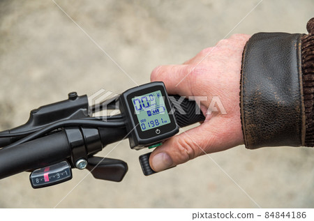 Hand on the trigger electronic accelerator of electric bike Hand on the trigger electronic accelerator of electric bike 84844186