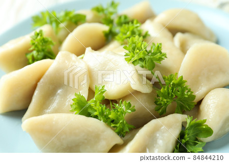 Concept of tasty food with vareniki or pierogi, close up 84844210