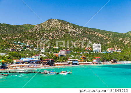 Summer Crimean beach. Landscape of Black Sea coast Summer Crimean beach. Landscape of Black Sea coast 84845913
