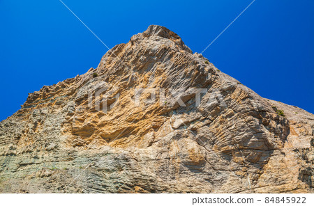 Rocky peak of a mountain at Golitsyn trail. Crimea 84845922