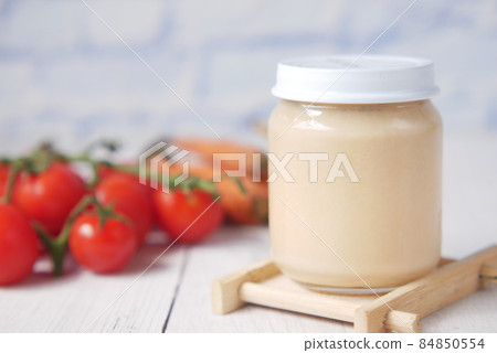 baby food in a container on table with copy space. 84850554
