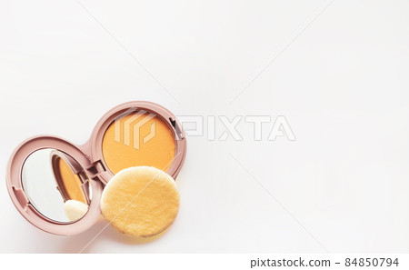 Compact powder for natural color make-up close-up isolated on a white background 84850794