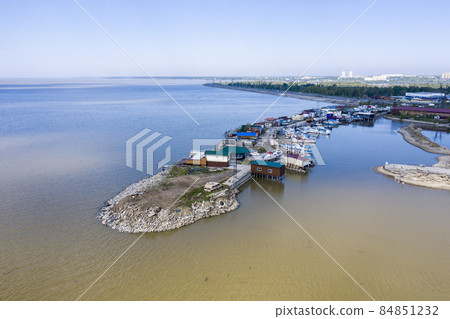 Aerial view of cape with berths for boats on Ob reservoir called the Ob Sea in Novosibirsk, Russia 84851232