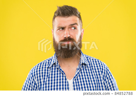 Man serious face raising eyebrow not confident. 84852788