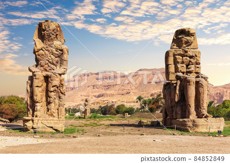 The Colossi of Memnon statues of the Pharaoh Amenhotep, Theban Necropolis, Luxor, Egypt The Colossi of Memnon statues of the Pharaoh Amenhotep, Theban Necropolis, Luxor, Egypt 84852849