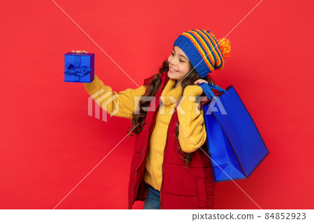 boxing day. present and gifts buy. shopping child with purchase. kid with package. boxing day. present and gifts buy. shopping child with purchase. kid with package. 84852923