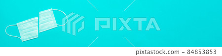 medical mask cut into 2 parts with space for text medical mask cut into 2 parts with space for text 84853853