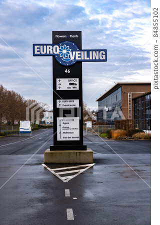 Neder-Over-Heembeek, Brussels, Belgium - 12 11 2021: Sign and entrance of the Euro flower auction site Neder-Over-Heembeek, Brussels, Belgium - 12 11 2021: Sign and entrance of the Euro flower auction site 84855102