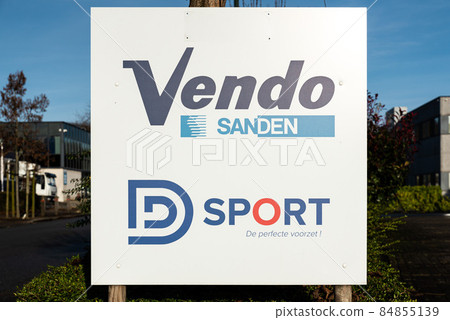 Neder-Over-Heembeek, Brussels, Belgium - 12 11 2021: The Vendo vending machine and d and d sport company Neder-Over-Heembeek, Brussels, Belgium - 12 11 2021: The Vendo vending machine and d and d sport company 84855139