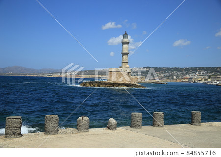 Beautiful view from the harbor to Venetian lighthouse in the port of Chania on the northern coast of the Greek island of Crete. High quality photo Beautiful view from the harbor to Venetian lighthouse in the port of Chania on the northern coast of the Greek island of Crete. High quality photo 84855716
