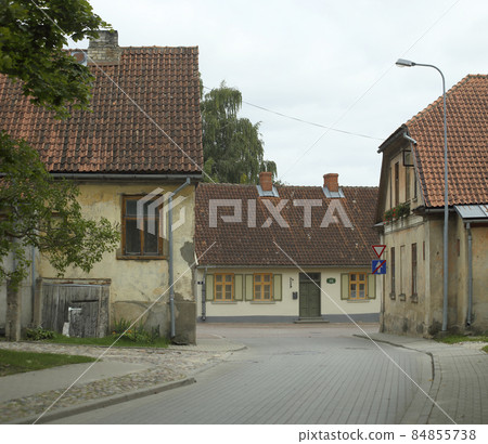 Urban landscape, Medieval town. Houses with tiled roofs. Kuldiga, Latvia. High quality photo Urban landscape, Medieval town. Houses with tiled roofs. Kuldiga, Latvia. High quality photo 84855738