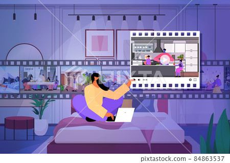 woman blogger sharing or watching videos at social networks making posts for followers social media addiction 84863537
