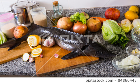 Sturgeon fish with fresh fruits and vegetables Sturgeon fish with fresh fruits and vegetables 84866445