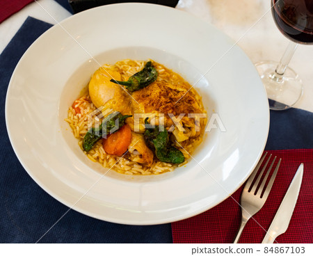 Traditional French cuisine, chicken thigh curry with rice 84867103