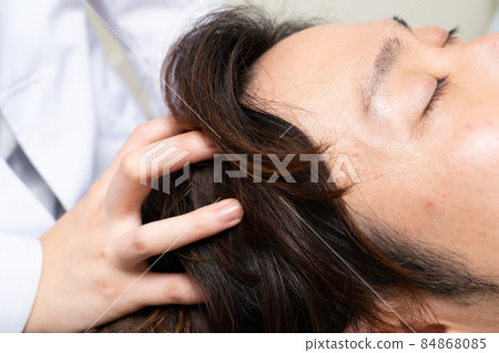 Men receiving head massage Men receiving head massage 84868085